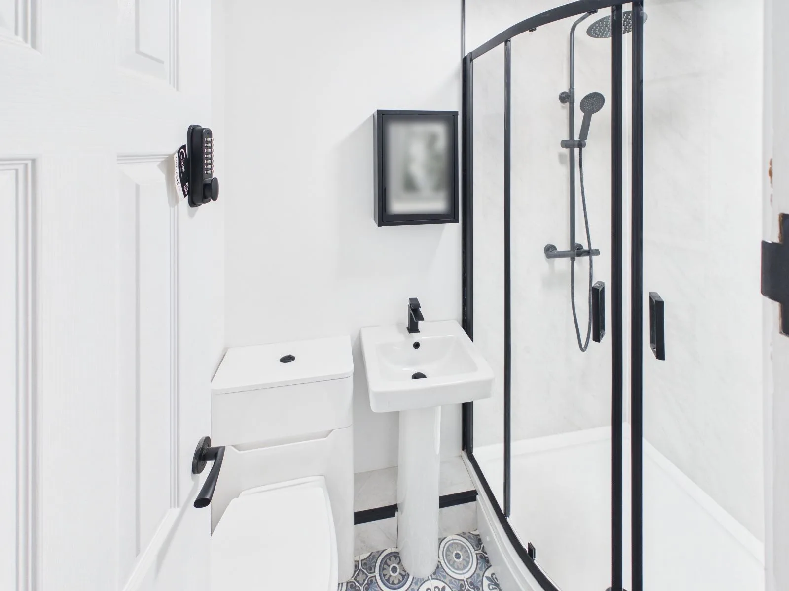En-suite with WC, pedestal basin and a quadrant shower at the completed Darlington HMO.